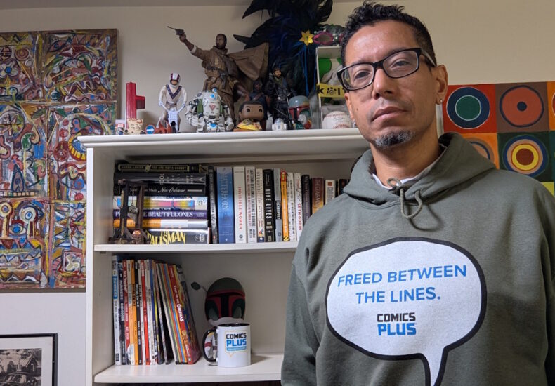 Me, in a green "Freed Between the Lines." hoodie.